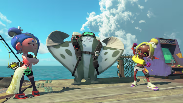 3 perronnage de Splatoon Raiders devant l'océan d